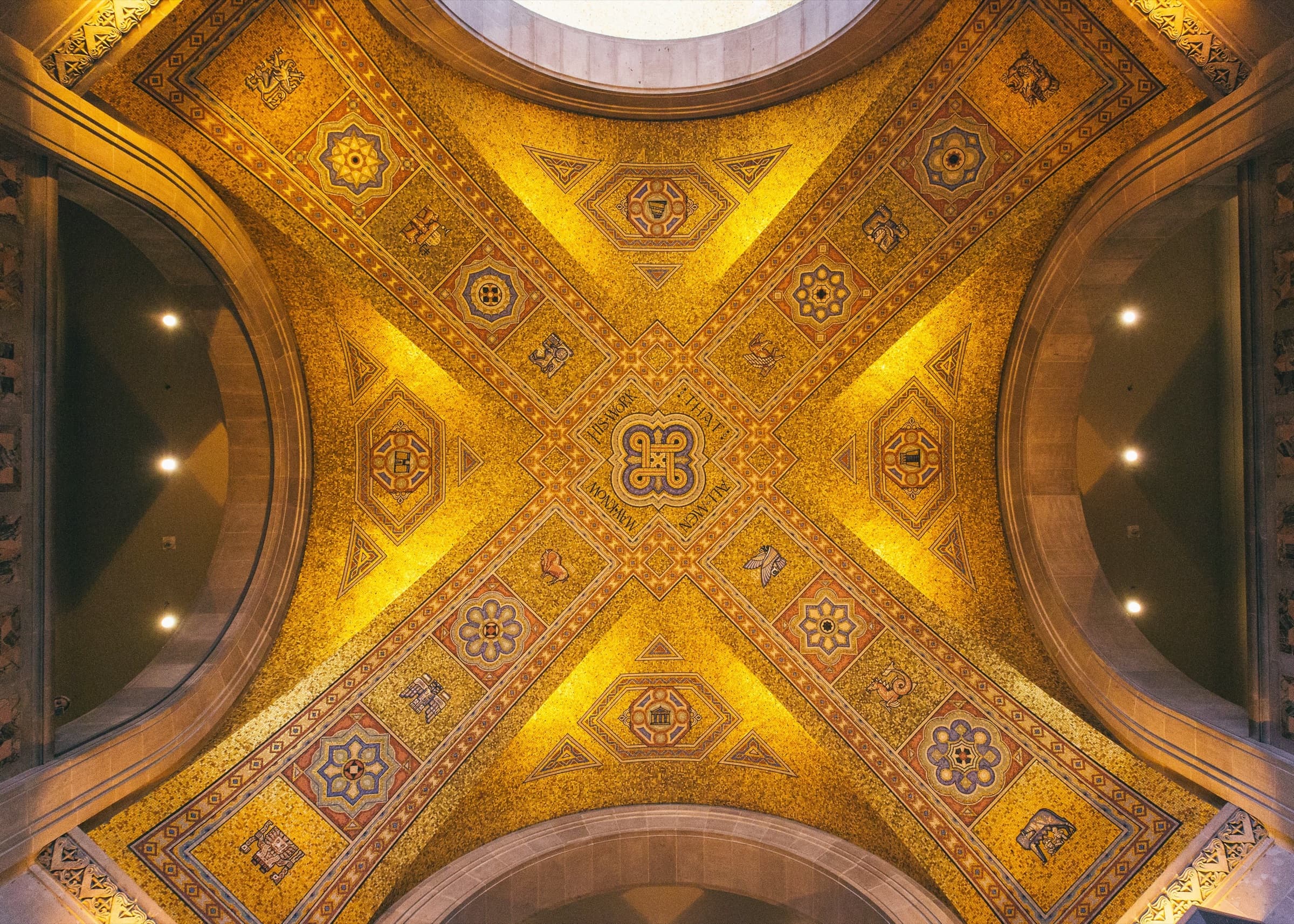 Wide view of the ROM rotunda ceiling mosaic, the knot at the centre of a cross of gold tile