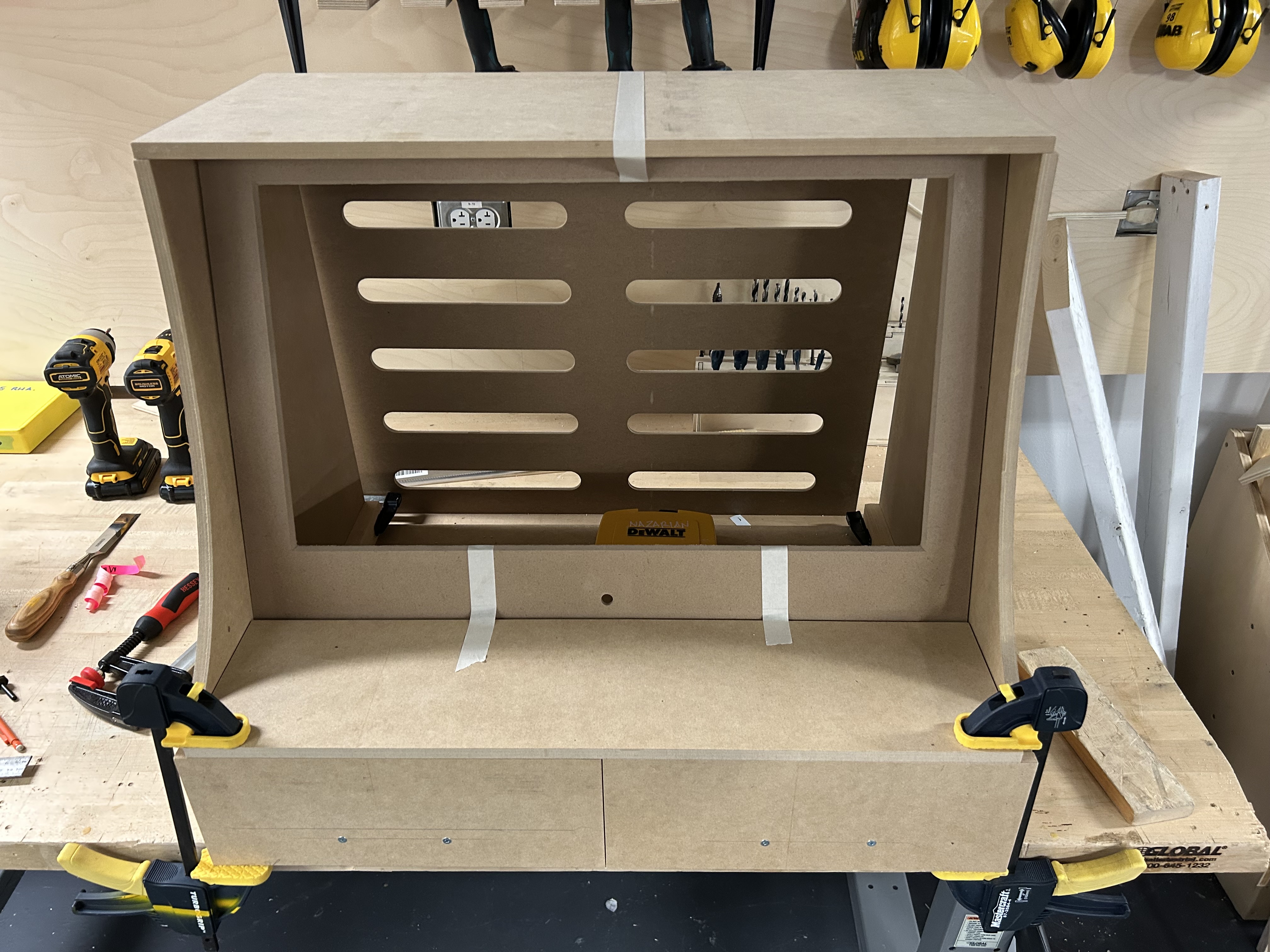 Cabinet designed to enclose a 27 inch monitor